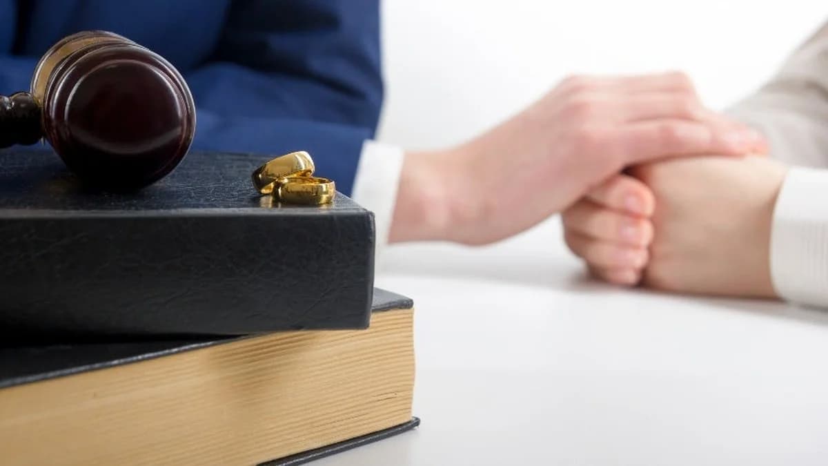 Compassionate personal injury attorney providing emotional support and explaining legal options to injured accident victim during difficult recovery